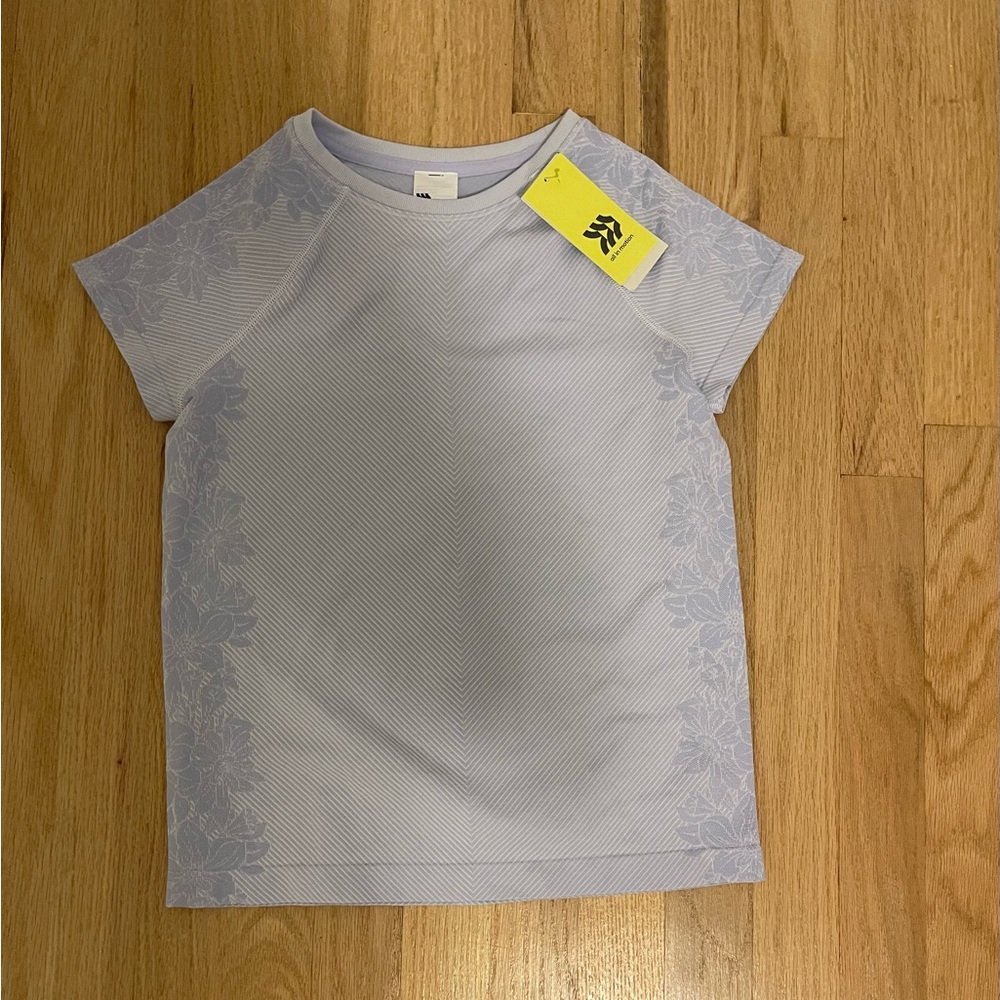 Target girls athletic shirt in lavender; size large (10/12)